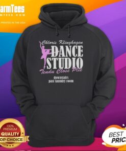 Alt Text: Premium Chloris Klinghagen Dance Studio dancer in tendu position near laundry room wearing a stylish hoodie.