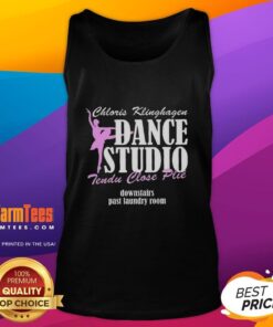 Alt Text: Dancer in Premium Chloris Klinghagen Dance Studio wearing a letter tank top, showcasing a tendu and pli near laundry room.