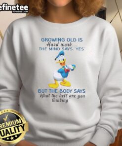 Premium Donald Duck sweatshirt featuring 'Growing Old Is Hard Work' quote, perfect for Disney fans and cozy wear.