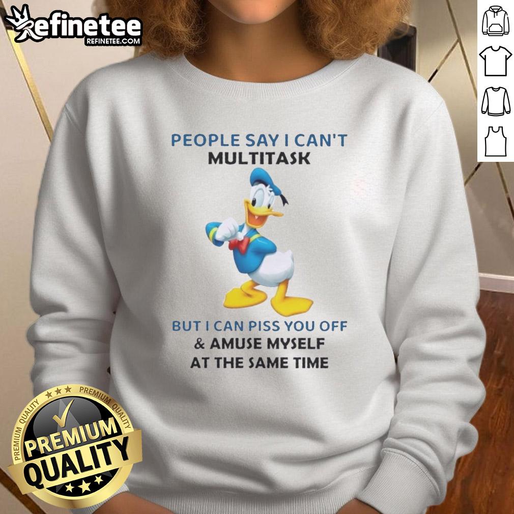 premium-donald-duck-people-say-i-cant-multitask-but-i-can-piss-you-off-and-amuse-myself-at-the-same-time-sweatshirt Premium Donald Duck sweatshirt featuring the humorous quote about multitasking and amusing oneself.