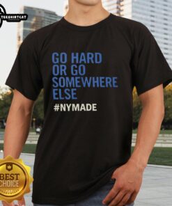 Premium Go Hard Or Go Somewhere Else Nymade T-Shirt displayed on a hanger, showcasing its stylish design and quality fabric.