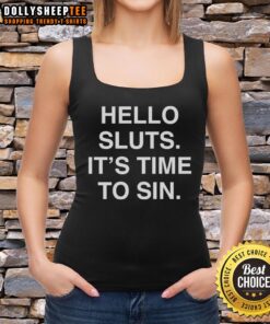 Model wearing a Premium 'Hello Sluts, It's Time to Sin' tank top, showcasing trendy graphic design and casual style.