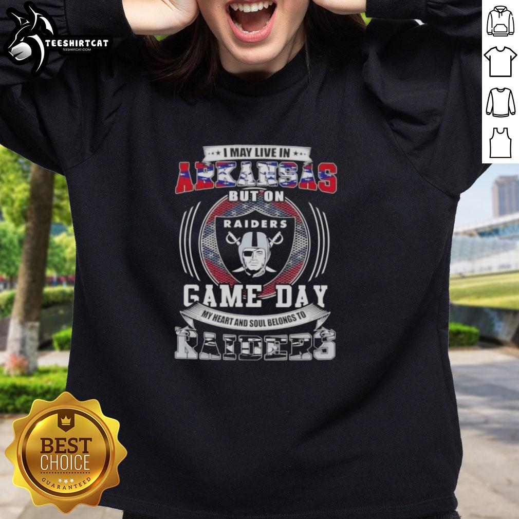 premium-i-may-live-in-arkansas-but-on-game-day-my-heart-and-soul-belongs-to-las-vegas-raiders-football-sweatshirt Alt Text: Premium sweatshirt with I May Live In Arkansas But My Heart Belongs To Las Vegas Raiders design for football fans.