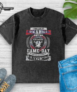 Premium washed t-shirt featuring 'I May Live In Arkansas But My Heart Belongs To Las Vegas Raiders Football' design.
