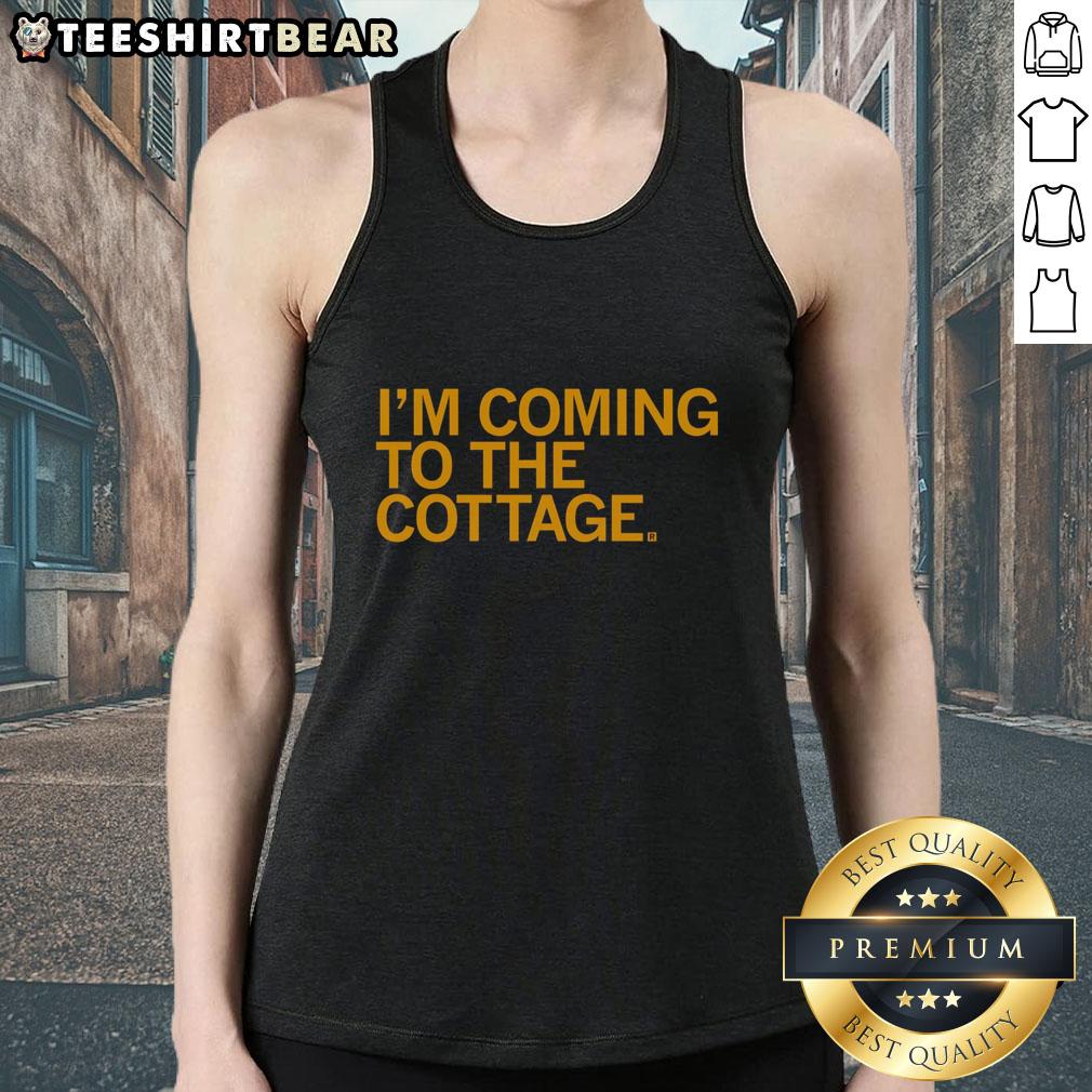 premium-im-coming-to-the-cottage-tank-top Premium 'I'm Coming to the Cottage' tank top displayed on a rustic wooden background, perfect for summer outings.