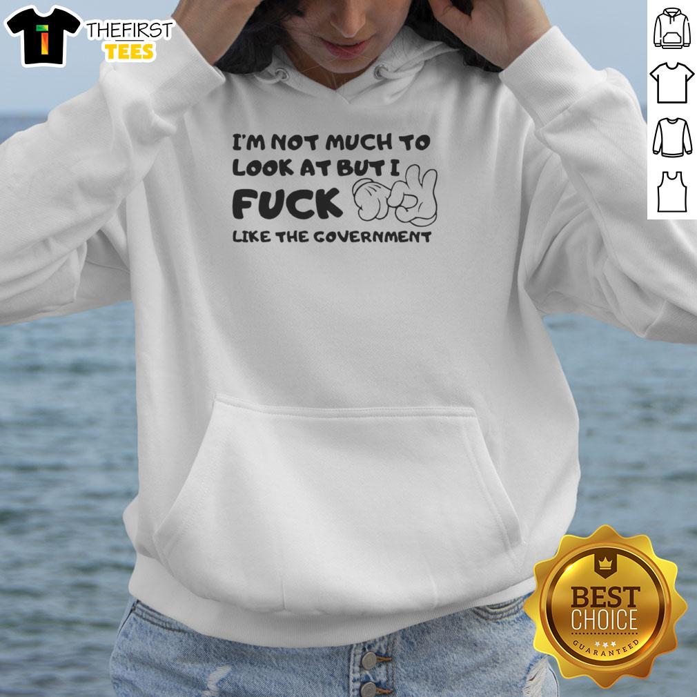 premium-im-not-much-to-look-at-but-i-fck-like-the-government-hoodie Premium 'I'm Not Much To Look At But I Fck Like The Government' hoodie in black, showcasing a bold graphic design.