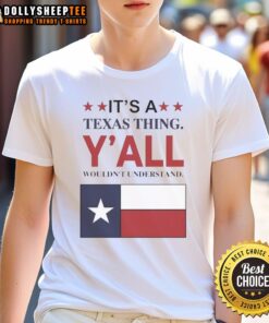 Premium 'It's A Texas Thing Y'all Wouldn't Understand' flag t-shirt displayed on a rustic background, perfect for Texas pride.