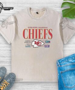 Alt Text: Vintage washed t-shirt featuring the Premium Kansas City Chiefs NFL Super Bowl Champions logo and championships design.