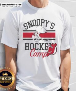 Premium New Jersey Devils Snoopy's Hockey Camps 2026 T-Shirt featuring vibrant graphics and team colors for fans.