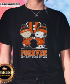 Alt Text: Premium Peanut Snoopy Charlie Brown Cincinnati Bengals t-shirt for ladies, celebrating fandom beyond game day.
