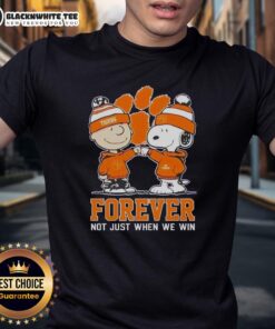 Alt Text: Premium Peanut Snoopy Charlie Brown Clemson Tigers T-Shirt celebrating team spirit, perfect for fans year-round.