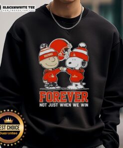 Premium Peanut Snoopy & Charlie Brown Cleveland Browns Forever sweatshirt, perfect for fans celebrating team spirit.