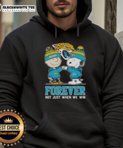 Premium Peanut Snoopy Charlie Brown Jacksonville Jaguars hoodie with 'Forever Not Just When We Win' slogan.