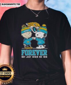 Premium Peanut Snoopy & Charlie Brown Jacksonville Jaguars tee for ladies, celebrating fandom beyond just winning.