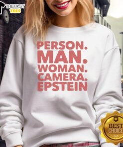 Premium person wearing Epstein sweatshirt, posing with camera, showcasing stylish casual fashion for men and women.