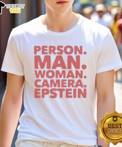 Premium man and woman wearing Epstein T-shirts, posing with a camera, showcasing trendy fashion and photography.