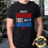 Premium 'Put Americans First Not Immigrants' T-Shirt in bold text, promoting patriotism and American values.