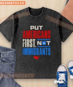 Premium 'Put Americans First, Not Immigrants' washed t-shirt in casual style, perfect for patriotic wear.