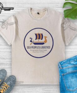 Alt Text: Premium Sea Peoples Logistics logo on a washed t-shirt, symbolizing disruption in global supply chains since 1177 BC.