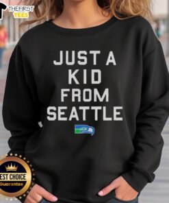 Alt Text: Premium Seattle Seahawks 'Just A Kid From Seattle' sweatshirt featuring team colors and logo, perfect for fans.