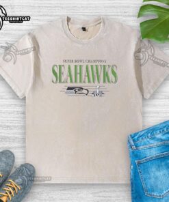 Alt Text: Vintage washed t-shirt featuring the Premium Seattle Seahawks Super Bowl Champions XLVIII trophy design.