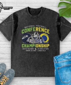 Alt Text: Premium Seattle Seahawks vs Los Angeles Rams NFC helmet graphic on a 2025 washed T-shirt, perfect for football fans.