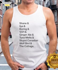 Alt Text: Premium Shane Ilya Boring Ginger Ale tank top featuring a whimsical Canadian wolf bird design at The Cottage.