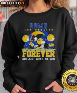 Alt Text: Premium Snoopy and Charlie Brown Los Angeles Rams sweatshirt featuring Forever, Not Just When We Win slogan.