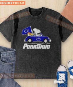 Premium Snoopy and Woodstock driving Penn State Nittany Lions washed t-shirt for fans and collectors.
