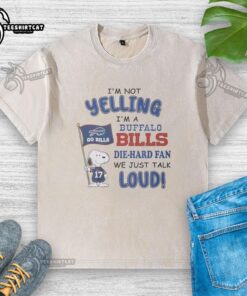 Premium Snoopy 'I'm Not Yelling, I'm a Buffalo Bills Die Hard Fan' washed t-shirt showcasing a fun design for sports fans.