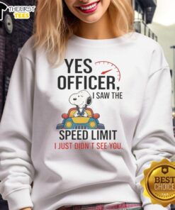 Premium Snoopy sweatshirt featuring 'Yes Officer, I Saw The Speed Limit, I Just Didn't See You' design in vibrant colors.