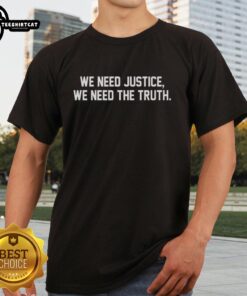 Alt Text: Premium We Need Justice We Need Truth T-Shirt featuring bold text design on a stylish black background.