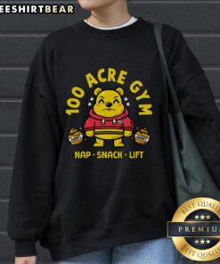 Cute sweatshirt featuring 'Pretty 100 Acre Gym Nap Snack Lift Bear' design, perfect for fitness and cozy wear.