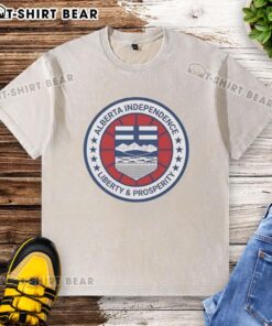 Pretty Alberta Independence Liberty and Prosperity Circle Logo on a Washed T-Shirt, showcasing a unique design and vibrant colors.