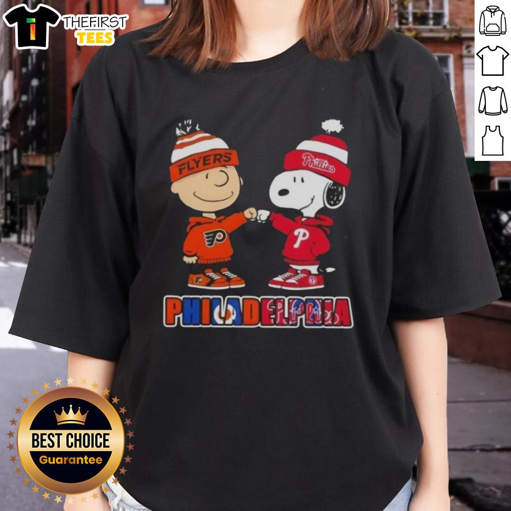 pretty-charlie-brown-fist-bump-snoopy-philadelphia-city-sports-phillies-x-flyers-ladies-tee Alt Text: Pretty Charlie Brown fist bump with Snoopy, showcasing Philadelphia City Sports Phillies X Flyers ladies tee.