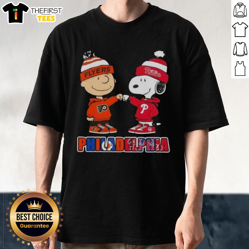 pretty-charlie-brown-fist-bump-snoopy-philadelphia-city-sports-phillies-x-flyers-t-shirt Pretty Charlie Brown fist bump with Snoopy on a Philadelphia sports T-shirt featuring Phillies and Flyers logos.