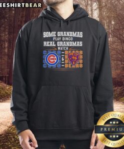 Grandmas play bingo in stylish Chicago Cubs and Bears hoodies, showcasing team spirit and fun in a vibrant setting.