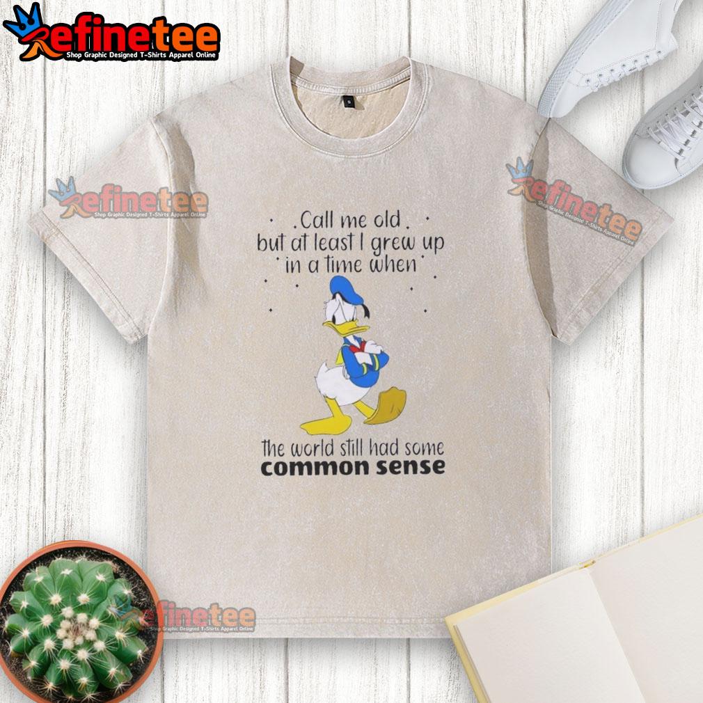 pretty-donald-duck-call-me-old-but-at-least-i-grew-up-in-a-time-when-the-world-still-had-common-sense-washed-t-shirt Pretty Donald Duck graphic on a washed t-shirt, featuring a nostalgic quote about common sense from a simpler time.