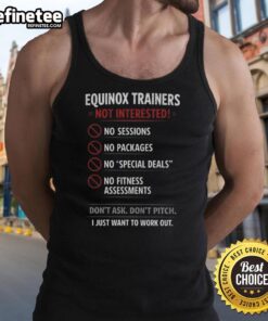 Stylish tank top with 'Not Interested, I Just Want to Work Out' slogan, paired with trendy Equinox trainers for fitness enthusiasts.