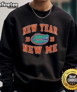 Alt Text: Stylish Florida Gators Football sweatshirt featuring the 2026 New Year, New Me logo, perfect for fans.
