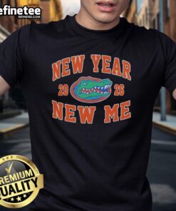 Alt Text: Pretty Florida Gators Football New Year New Me 2026 Logo T-Shirt featuring vibrant colors and team logo design.