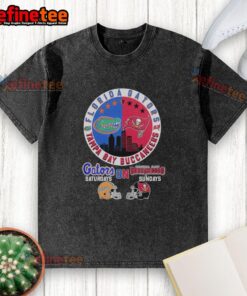 Alt Text: Pretty Florida Gators and Tampa Bay Buccaneers helmet logo mashup on a washed t-shirt for game day style.