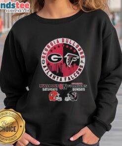 Stylish sweatshirt featuring a mashup of Georgia Bulldogs and Atlanta Falcons helmet logos for sports fans.