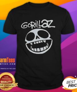 Alt Text: Stylish Gorillaz band skull logo t-shirt featuring vibrant colors and unique graphic design for music fans.