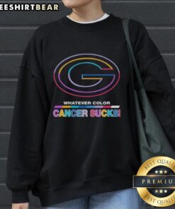 Alt Text: Green Bay Packers sweatshirt featuring 'Cancer Sucks' logo in vibrant colors, perfect for football fans.