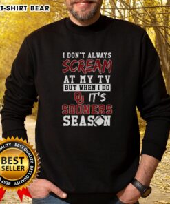 Cozy Oklahoma Sooners sweatshirt for NCAA football lovers, featuring a fun slogan about watching games enthusiastically.