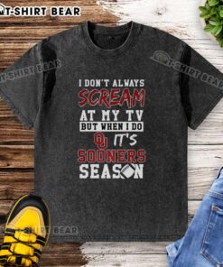 Oklahoma Sooners season NCAA football lover wearing a washed T-shirt, showcasing team spirit and fandom.