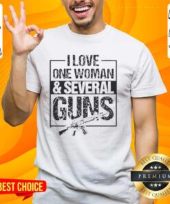 Vintage 'I Love One Woman And Several Guns' T-shirt design featuring bold graphics and a playful message.