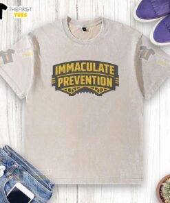 Pretty Immaculate Prevention City Pittsburgh Steelers football washed t-shirt displayed on a wooden background.