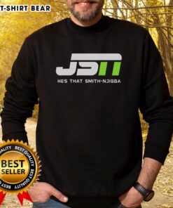 Alt Text: Jaxon Smith-Njigba wearing a Seattle Seahawks sweatshirt, showcasing his sporty style and team spirit.